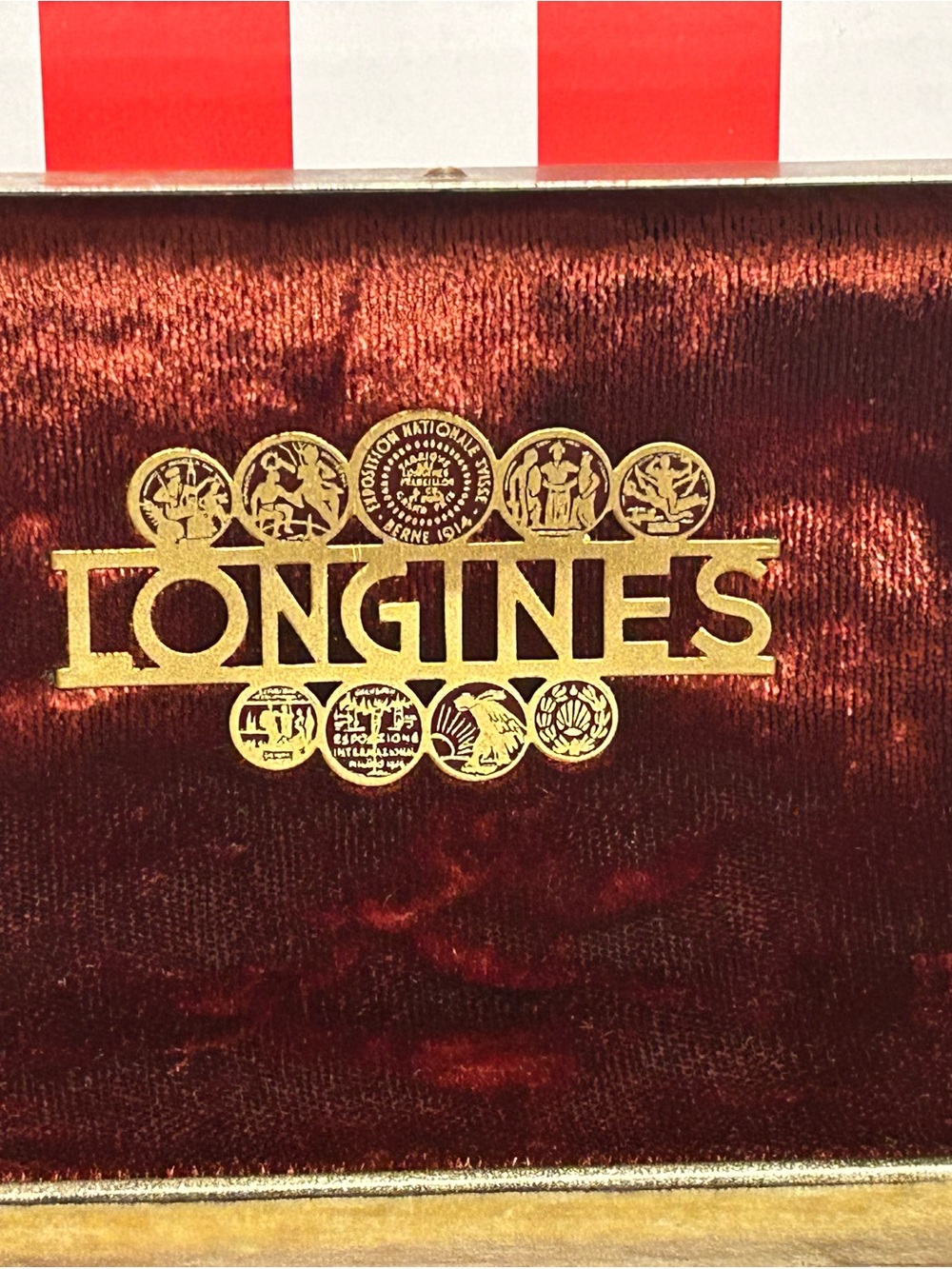 Antique 1914 Longines burgundy velvet presentation box with logo